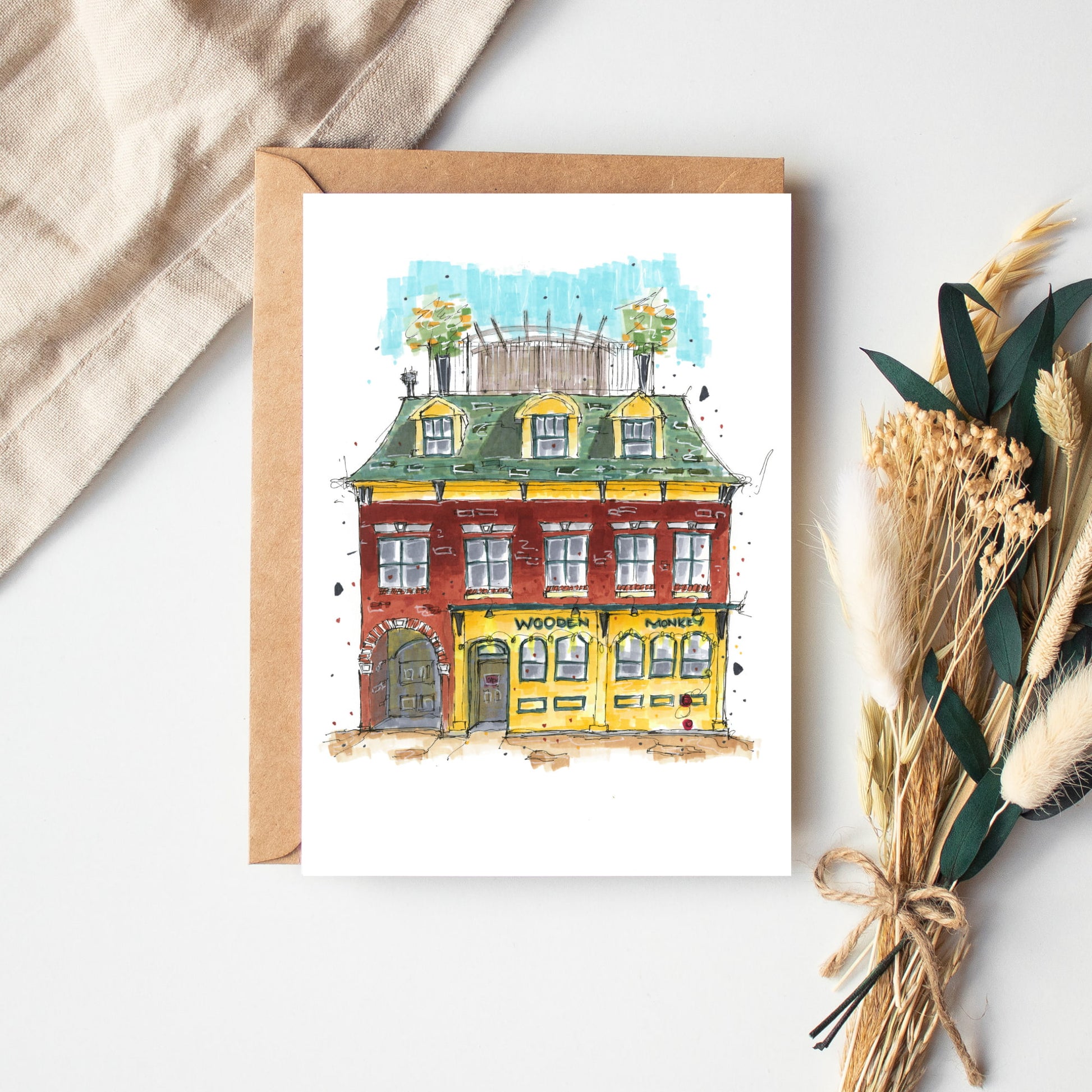 DTS0029 - The Wooden Monkey - Halifax - Storefront Sketch – Greeting Card with Envelope – Downtown Sketcher – Wynand van Niekerk
